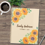 Yellow Sunflower Personalised 2023 Planner<br><div class="desc">This pretty Planner is decorated with watercolor sunflowers and green foliage on a soft beige background. The text is dark brown. You can personalise it by adding your name and changing the year. Use the Design Tool option to change the text size, style, and colour. Because we create our artwork...</div>
