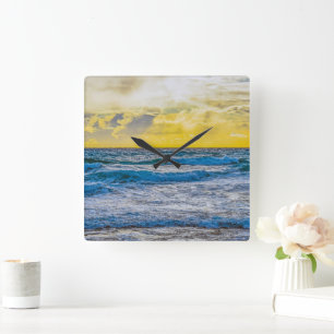 Yellow Sunset Over Blue Sea Square Wall Clock