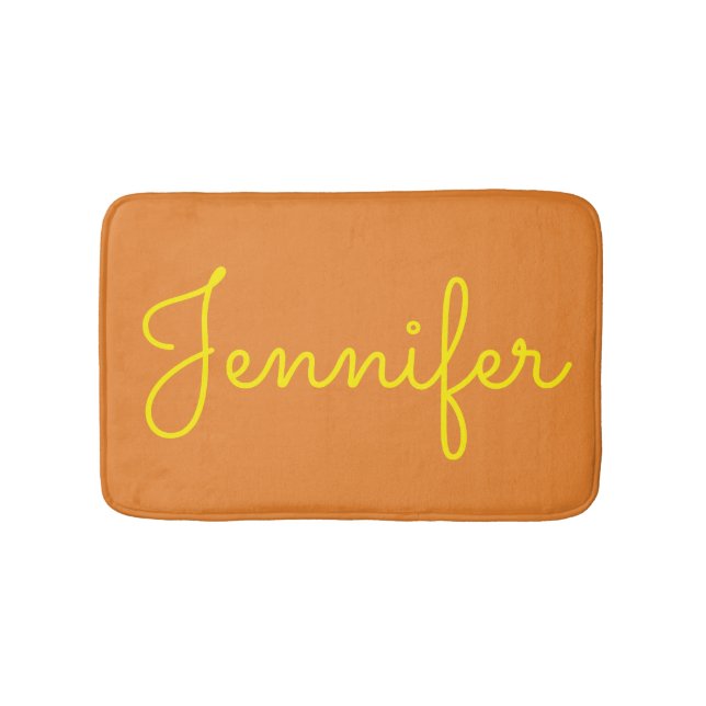 Yellow Text Custom Name on Orange Bath Mat (Front)