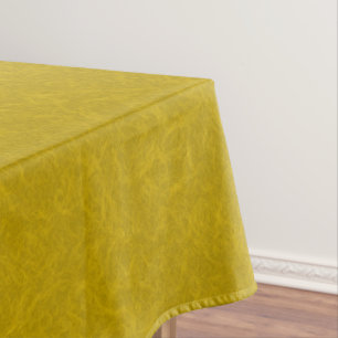 Yellow textured surface with  swirling pattern tablecloth