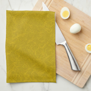 Yellow textured surface with swirling pattern tea towel