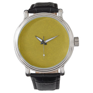 Yellow textured surface with swirling pattern watch