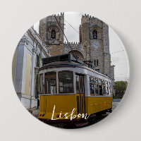 Yellow tram on Lisbon Cathedral in Portugal