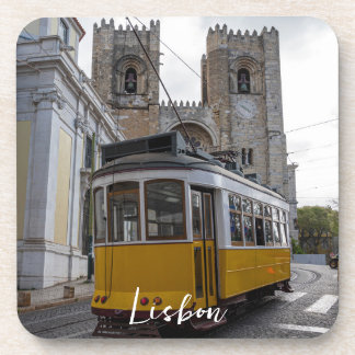 Yellow tram on Lisbon Cathedral in Portugal Coaster