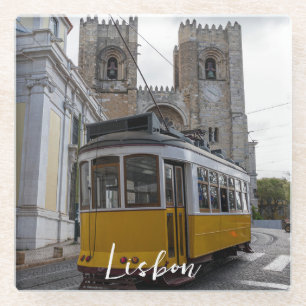 Yellow tram on Lisbon Cathedral in Portugal Glass Coaster