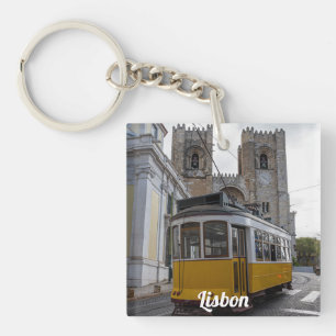 Yellow tram on Lisbon Cathedral in Portugal Key Ring