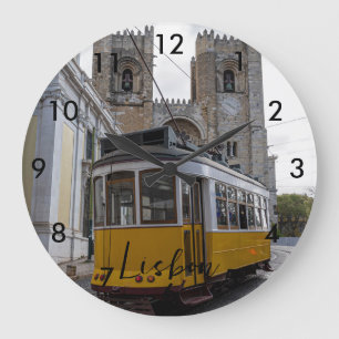 Yellow tram on Lisbon Cathedral in Portugal Large Clock