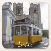 Yellow tram on Lisbon Cathedral in Portugal