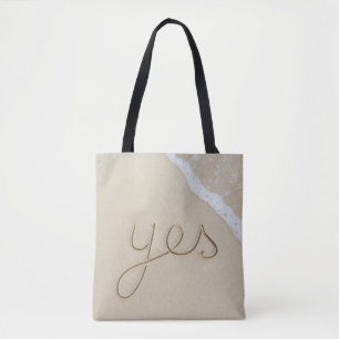 Yes carved word on the beach sand tote bag