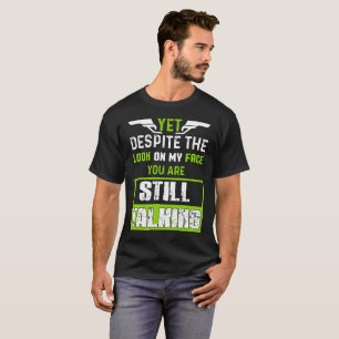Yet Despite the look on my face T-Shirt