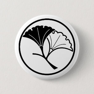 Yin and yang ginkgo leaves in threadlike ring 6 cm round badge