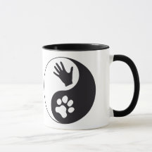 Yin and yang with hand and paw