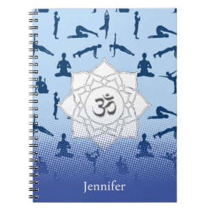 Yoga Poses And Lotus Flower On Blue Notebook