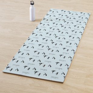 Yoga poses and text pattern on blue mat
