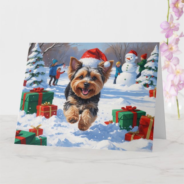 Yorkipoo Running in Snow with Christmas Hat Card (Orchid)