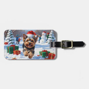 Yorkipoo Running in Snow with Christmas Hat Luggage Tag