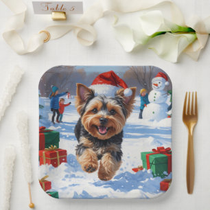 Yorkipoo Running in Snow with Christmas Hat Paper Plate