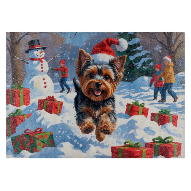 Yorkshire Terrier in Snow with Christmas Hat Cutting Board (Front)