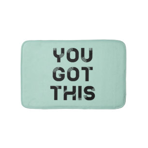 You got this black font bath mat