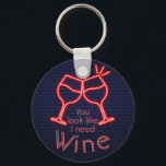 You Look Like I Need Wine Key Ring<br><div class="desc">Round button keychain features fun text "You Look Like I Need Wine" and two neon wine glasses on a midnight blue brick background. Keychains make memorable gifts for family and friends or create for yourself. Change to your favourite wine.</div>