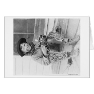 Young Boy Dressed as Cowboy with Toys
