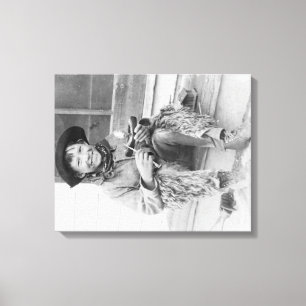 Young Boy Dressed as Cowboy with Toys Canvas Print