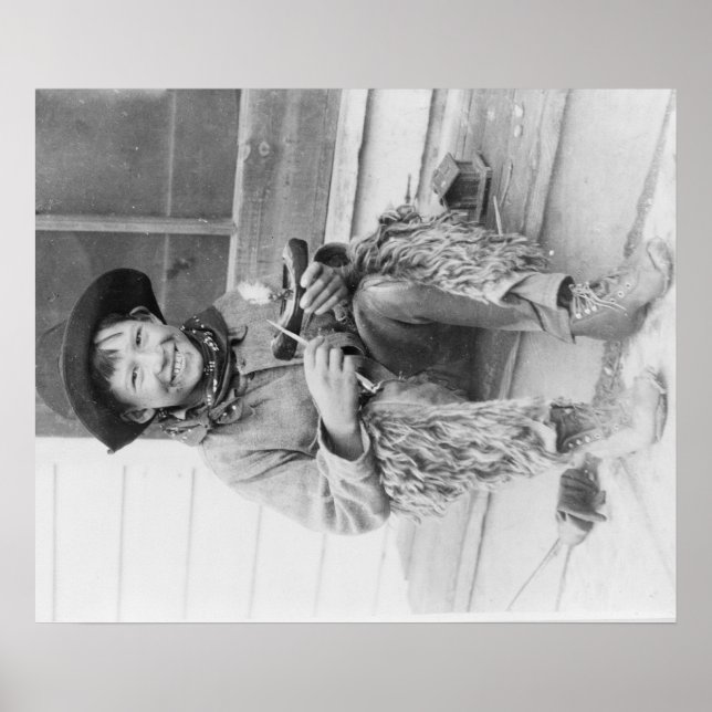 Young Boy Dressed as Cowboy with Toys Poster (Front)