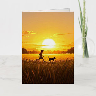Young boy running with dog at sunset foil greeting card