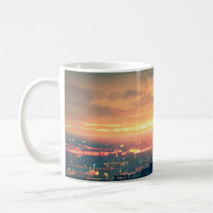 young couple standing on the roof top looking at c coffee mug