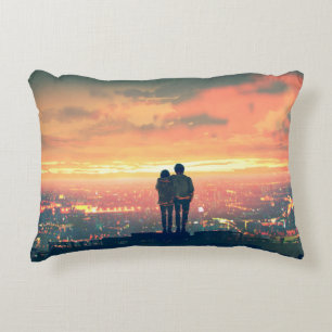 young couple standing on the roof top looking at c decorative cushion