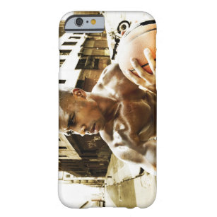 Young man holding basketball barely there iPhone 6 case