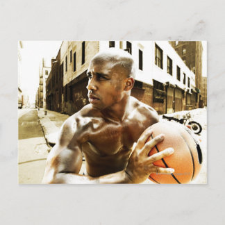 Young man holding basketball postcard