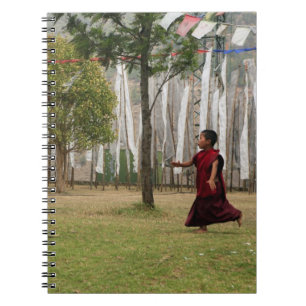 Young monk and prayer flags notebook