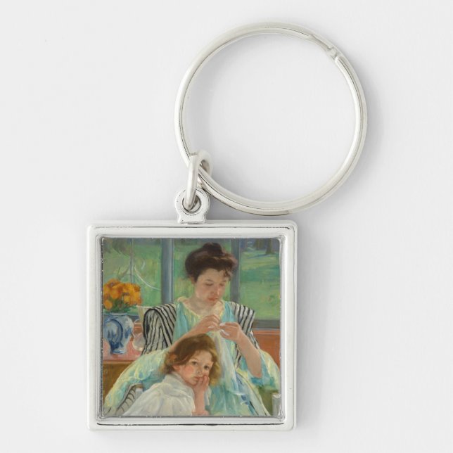 Young Mother Sewing Key Ring (Front)