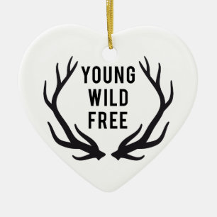 young, wild, free, text design with deer antlers ceramic tree decoration