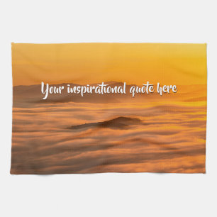 Your custom text sunrise above foggy landscape tea towel