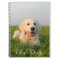 Your cute puppy on a spiral notebook