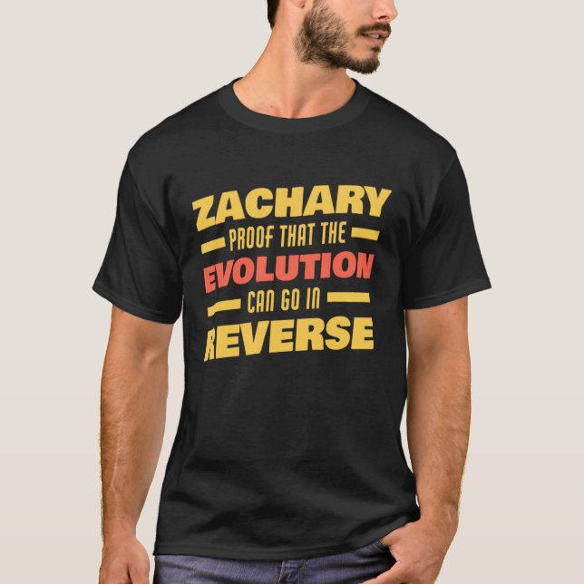 Zachary Evolution Can Go In Reverse Saying  Zachar T-Shirt (Front)