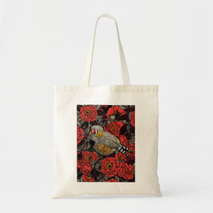 Zebra finch and red rose bush tote bag