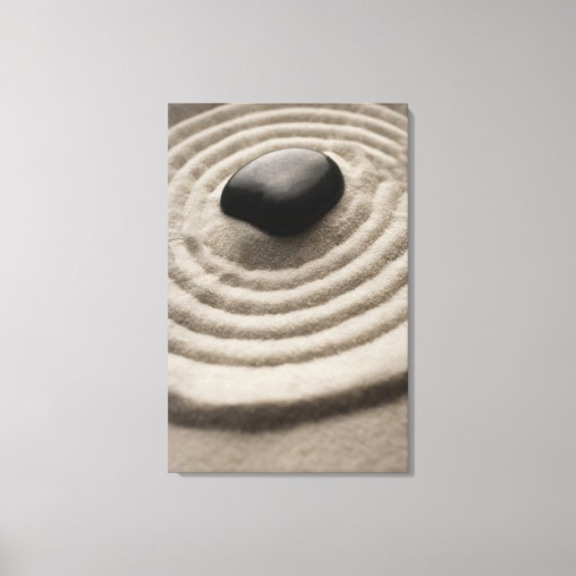 zen garden with pebble detail on raked sand canvas print (Front)