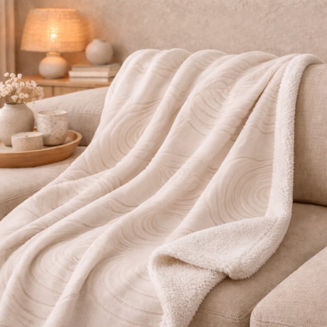 Zen Stone Ripple Sherpa Blanket (Stone-inspired ripple pattern in light tan flowing across smooth ivory)